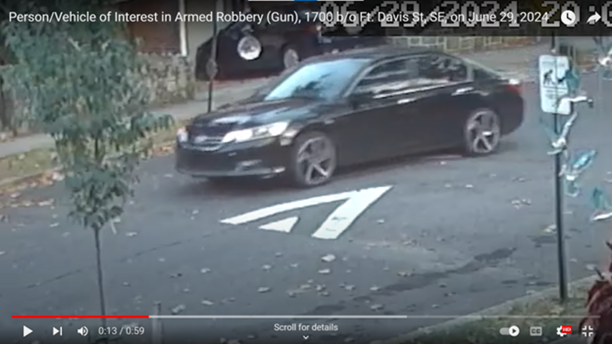 Washington, DC police reunite woman with dog stolen during armed robbery