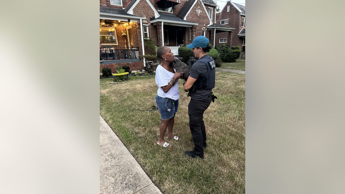 Washington, DC police reunite woman with dog stolen during armed robbery