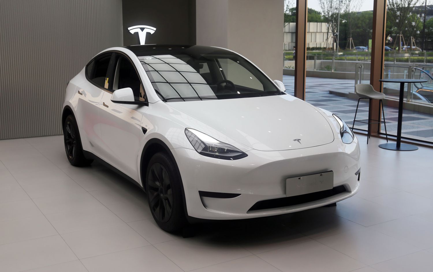 Top Stock Movers Now: Tesla, Newmont, GM, and More