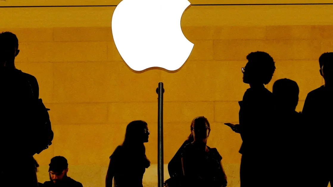 Apple earnings top Wall Street forecasts while iPhone, China sales fall short