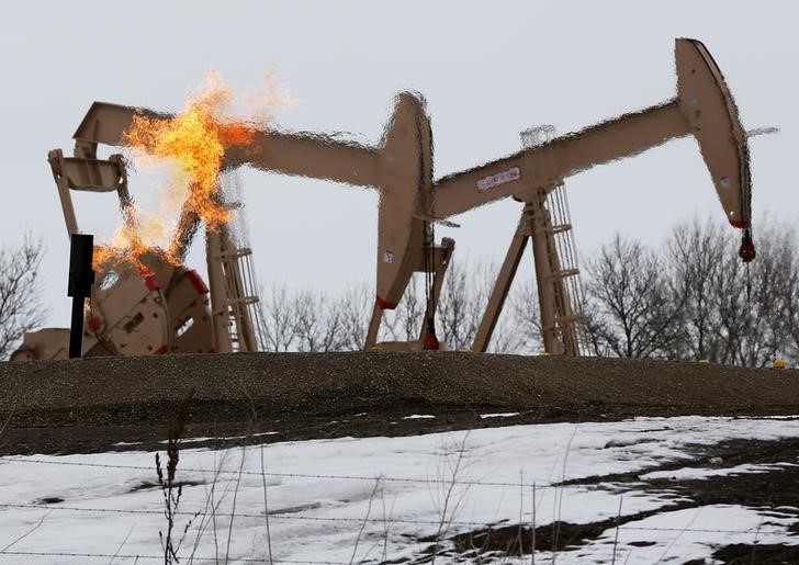 Oil prices fall; US-China trade dispute weighs