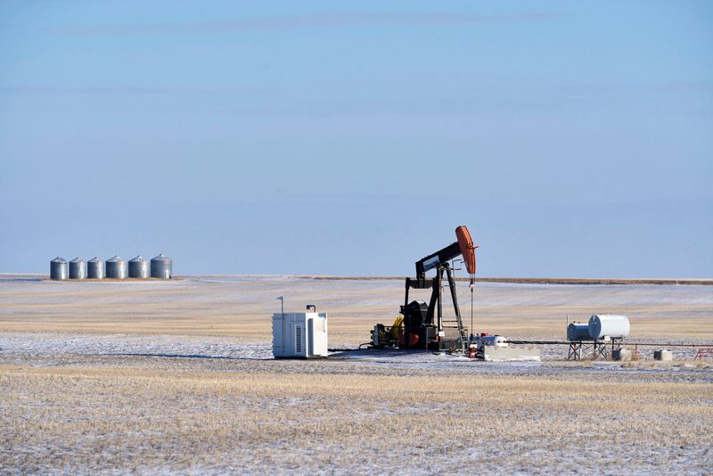 Oil climbs on supply worries, Trump tariffs check gains