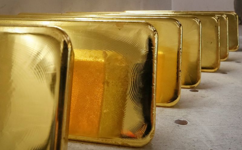 Gold prices pare some gains after hitting fresh record