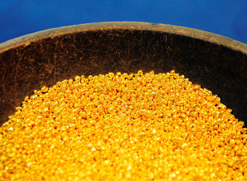 Gold prices fall from recent peaks on profit taking
