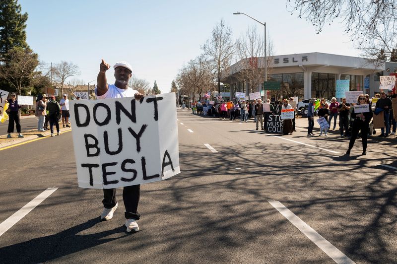 Trump says violence against Tesla is domestic terrorism