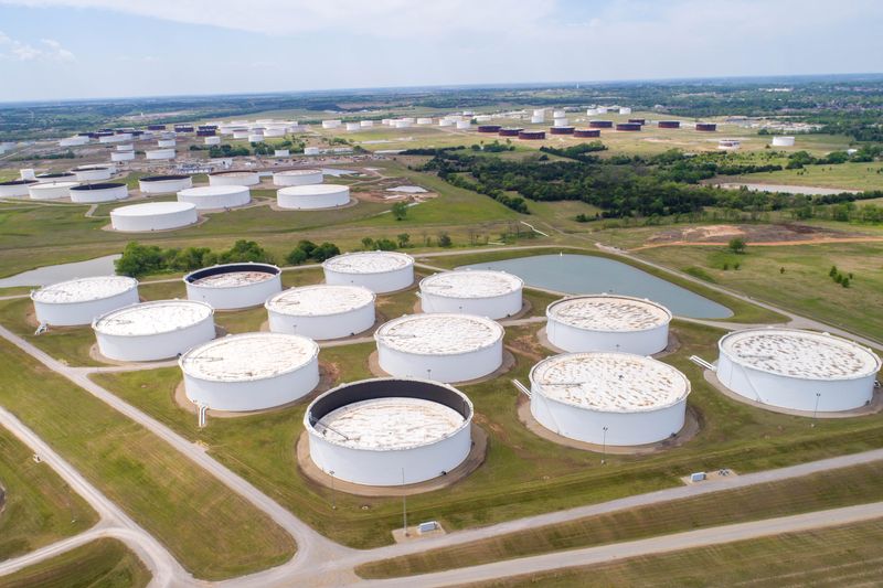 Oil retreats amid tariff worries, set for third week of gains on supply woes