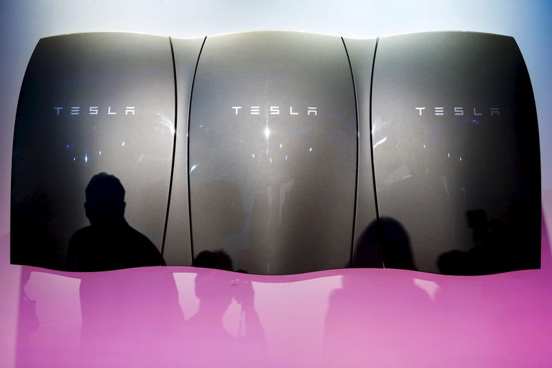 Tesla, Merck Surge Amid Friday’s Market Cap Stock Movers