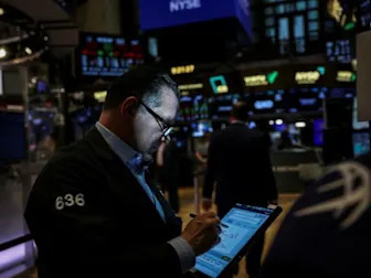 Wall St edges lower as markets await Nvidia earnings