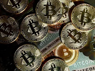 Crypto funds' assets hit record high as investors hedge and diversify