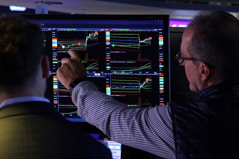 Wall St ends higher as rate-cut hopes offset Iran war fears