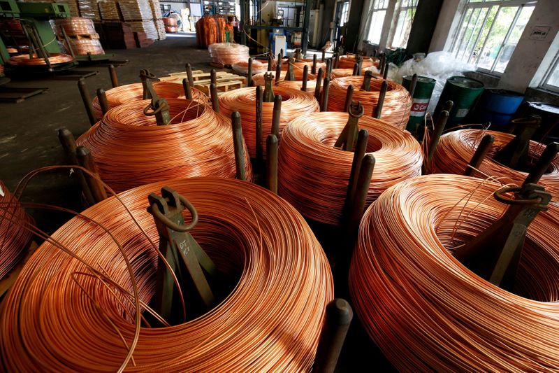 Gold prices pressured by dollar strength; Copper hits record high on Trump tariff