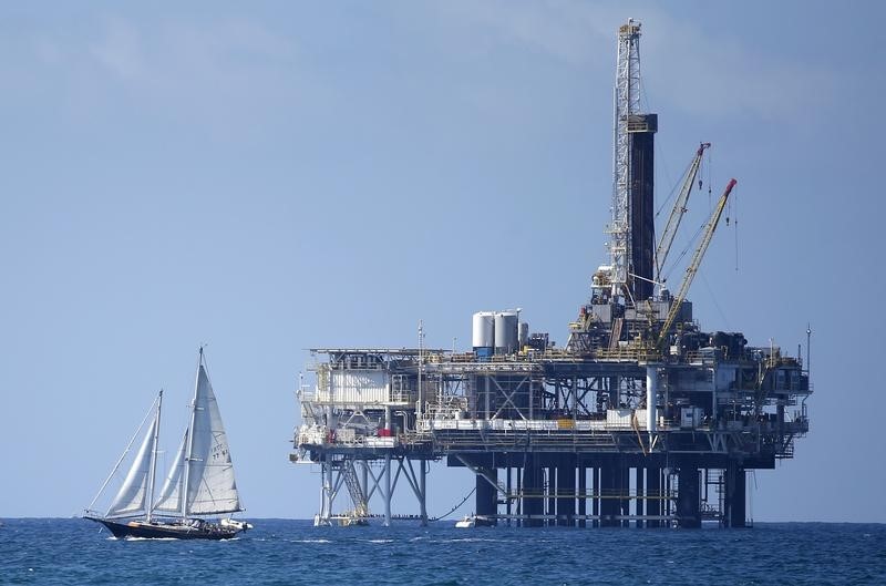 Oil prices steady as markets watch Trump tariff spree, US inventory spike