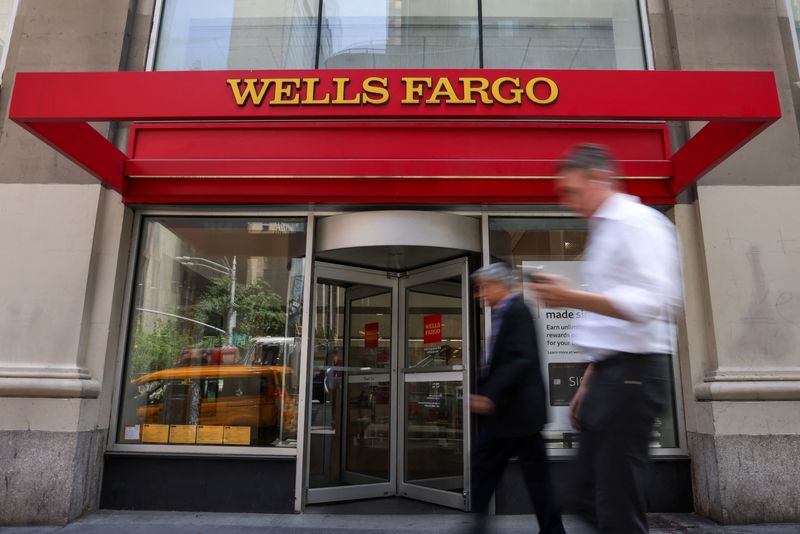 Wells Fargo profit beats estimates, cut to interest income forecast weighs on shares